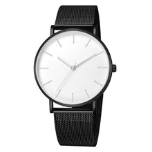 Montre unisexe noire avec cadran blanc minimaliste et bracelet maille acier fin. - Kiorr™