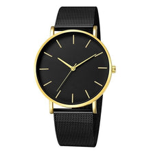 Montre mince noire avec cadran rond noir et détails dorés, bracelet maille acier inoxydable noir. - Kiorr™