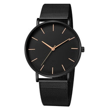 Montre unisexe noire avec bracelet maille fine en acier inoxydable et cadran minimaliste aux index dorés. - Kiorr™