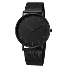Montre slim noire unisexe avec bracelet maille acier inoxydable et cadran minimaliste. - Kiorr™